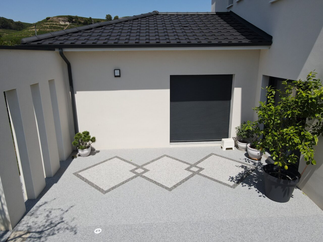 Terrass en en résine / Moquette de pierre sur Lorient