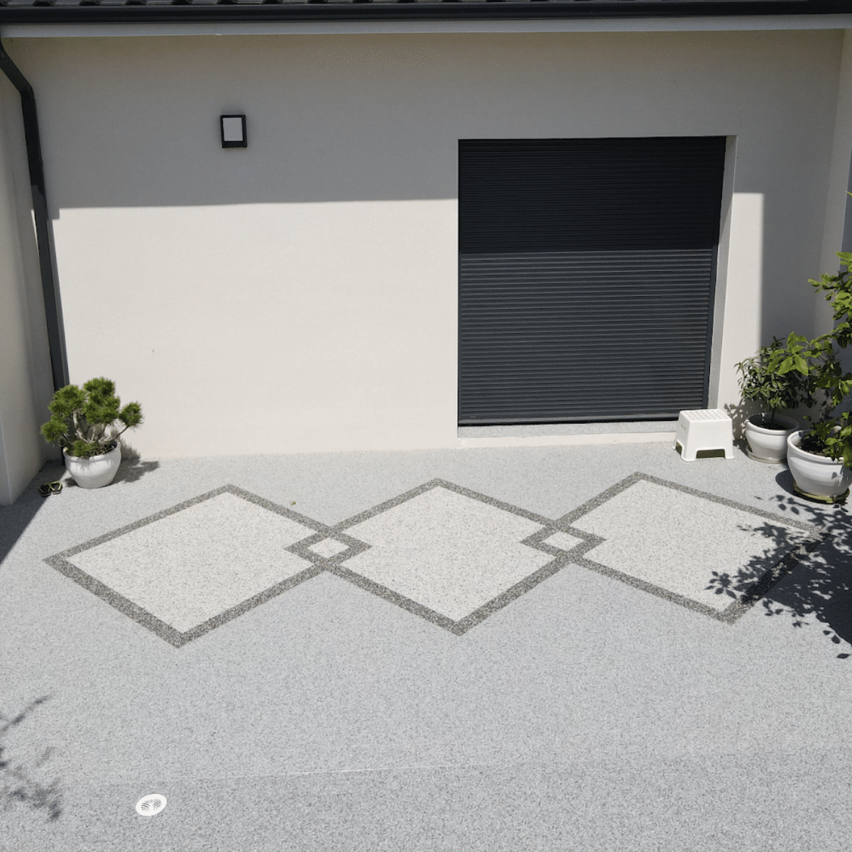 https://perenia.fr/wp-content/uploads/2026/09/entree_maison_resine.png