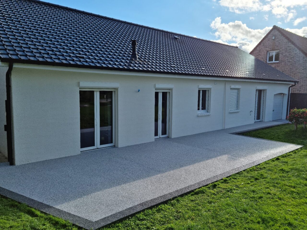 https://perenia.fr/wp-content/uploads/2026/09/terrasse_resine-2-1280x960.jpg